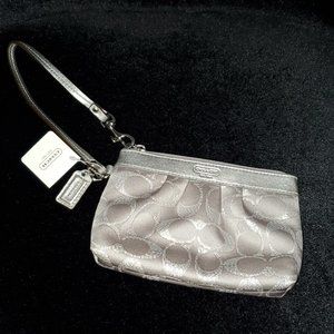 Coach Classic Signature Silver Wristlet  New with Tags.